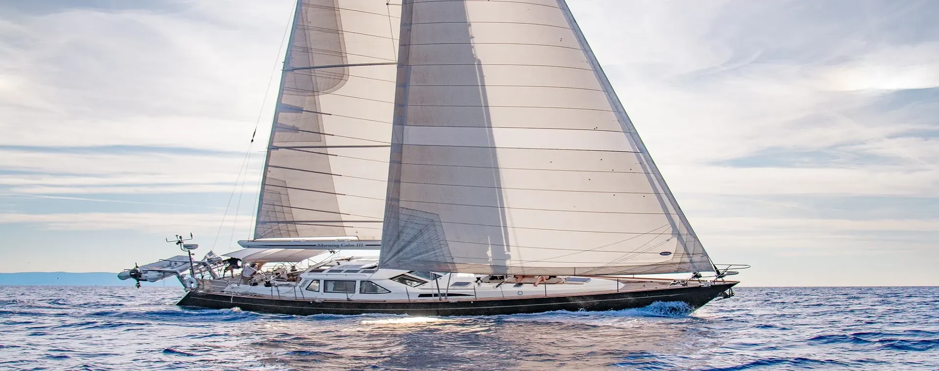 Offshore sailing yacht underway in calm Caribbean conditions